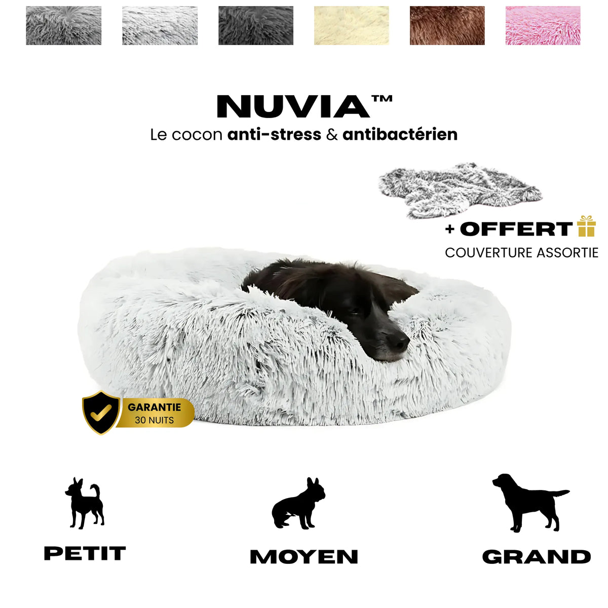 Lit cocon rond Nuvia gris clair à poils longs, chien noir couché dedans